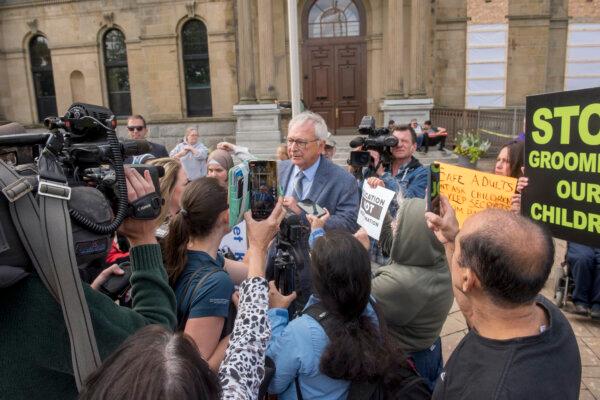 Premier Blaine Higgs speaks with media in front of the New Brunswick legislature in Fredericton on Sept. 20, 2023. Mr. Higgs attended a protest, one of many across Canada, organized by "1MillionMarch4Children," to uphold parental rights in schools. (The Canadian Press/Stephen MacGillivray)