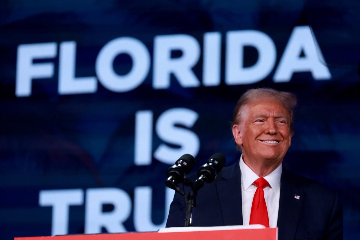 Republican presidential candidate former President Donald Trump smiles during the Florida Freedom Summit at the Gaylord Palms Resort in Kissimmee, Fla., on Nov. 4, 2023. (Joe Raedle/Getty Images)