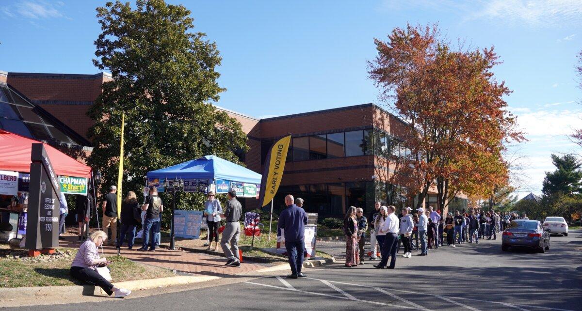Voters form a long line outside the Loudoun County Office of Elections in Leesburg, Va., on Nov. 4, 2023, the last day of in-person early voting. (Terri Wu/The Epoch Times)