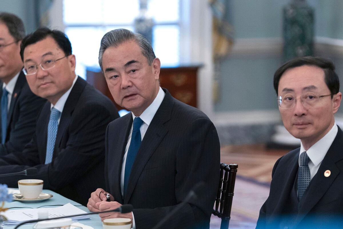 Chinese foreign minister Wang Yi (C) during a bilateral meeting with Secretary of State Antony Blinken at the State Department in Washington, on Oct. 27, 2023. (Jose Luis Magana/AP Photo)