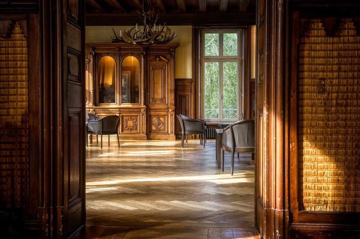 Solid hardwood flooring is warm, stately, and timeless. If treated right, it can last for centuries. (Unsplash)