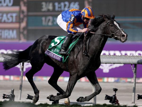 Jockey Ryan Moore rides Auguste Rodin of Ireland during the Longines Breeders' Cup Turf (Grade 1) at Santa Anita Park in Arcadia, Calif., on Nov. 4, 2023. (Harry How/Getty Images)