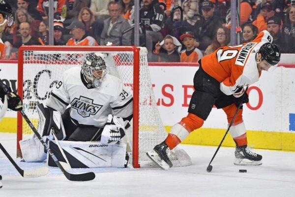 Philadelphia Flyers right wing Garnet Hathaway (19) tries to control the puck against Los Angeles Kings goaltender Cam Talbot (39) during the second period in Philadelphia on Nov. 4, 2023. (Eric Hartline/USA TODAY Sports via Field Level Media)