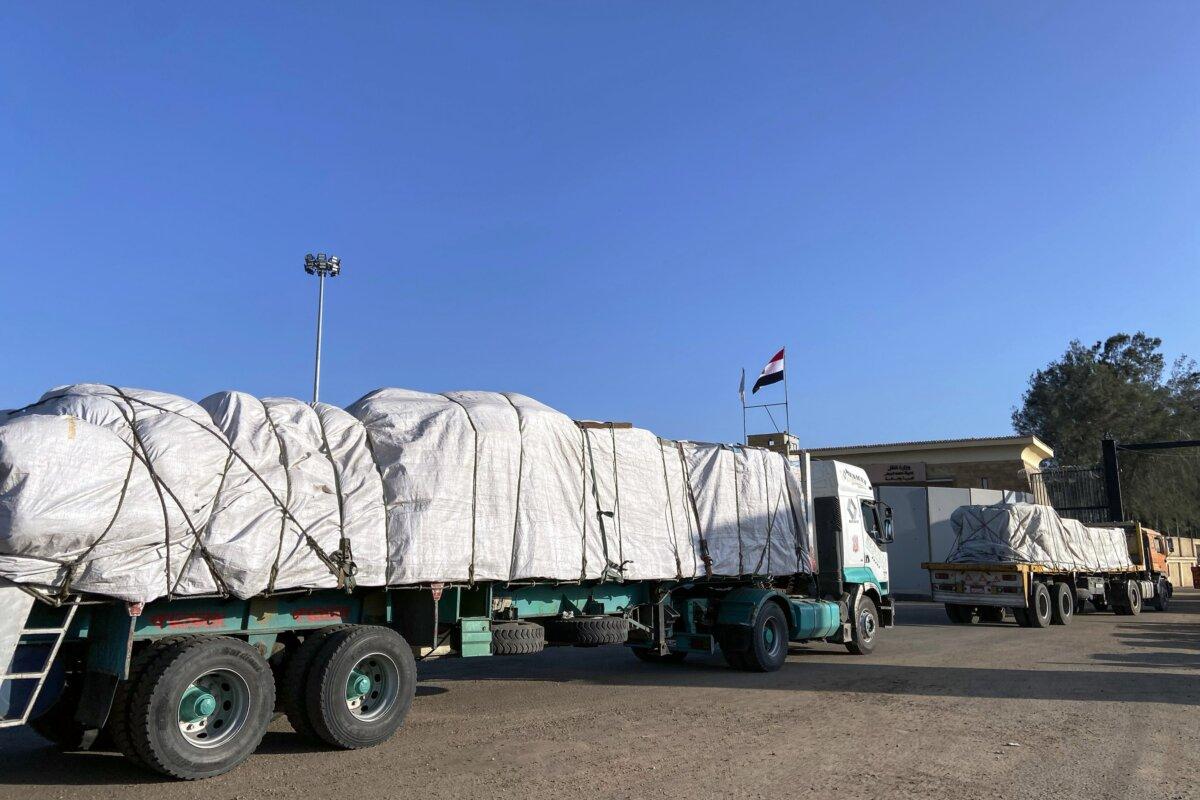 Aid convoy trucks cross the Rafah border from the Egyptian side in Rafah, Egypt, on Nov. 6, 2023. (Mahmoud Khaled/Getty Images)