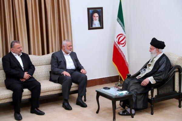 Iranian Supreme Leader Ayatollah Ali Khamenei meets with Palestinian terrorist group Hamas's top leader, Ismail Haniyeh, in Tehran, Iran, on June 21, 2023. (Office of the Iranian Supreme Leader/WANA/Reuters)