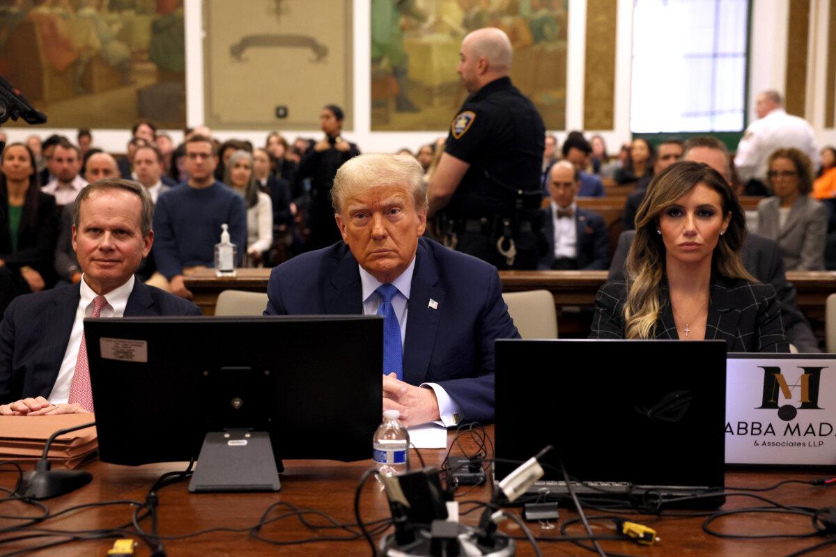 Former President Donald Trump sits in the courtroom flanked by his attorneys Christopher Kise and Alina Habba during his civil fraud trial at New York State Supreme Court in New York City on Nov. 6, 2023. (Brendan McDermid-Pool/Getty Images)