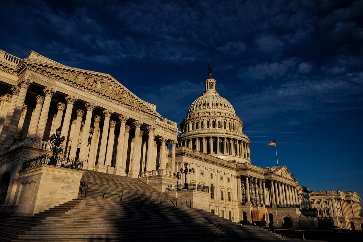  The U.S. Capitol, lit by the rising sun, in Washington on Nov. 8, 2022. (Samuel Corum/Getty Images)