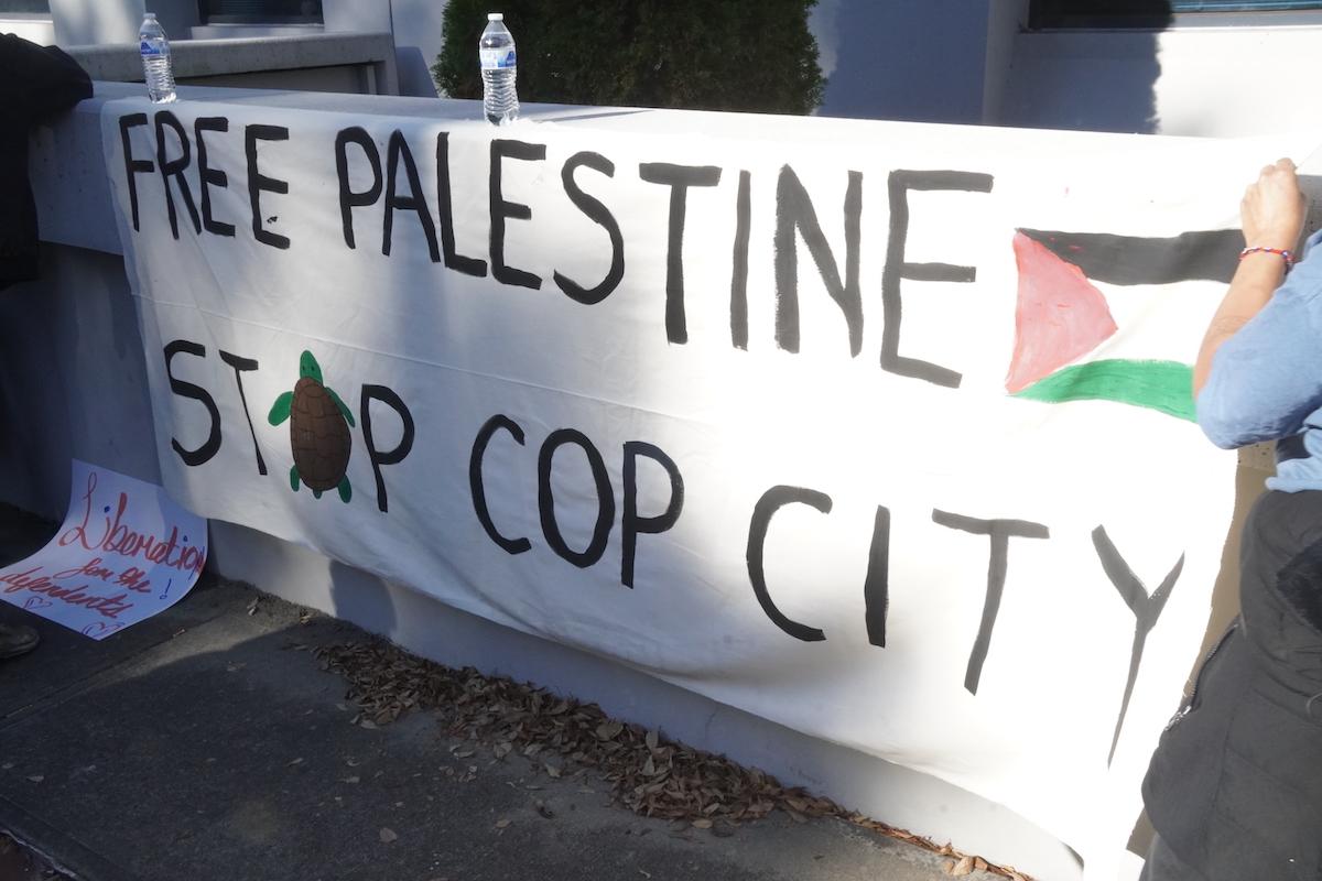A "Free Palestine" banner at a protest against the arraignment of 61 "Stop Cop City" activists in Atlanta, Ga. on Nov. 6, 2023. (Jackson Elliott/The Epoch Times)