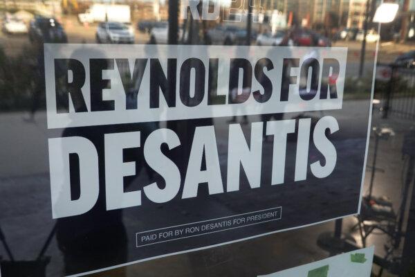 A campaign sign hangs on a door at The River Center before the start of a campaign rally hosted by Republican presidential candidate Florida Gov. Ron DeSantis in Des Moines, Iowa, on Nov. 6, 2023. (Scott Olson/Getty Images)