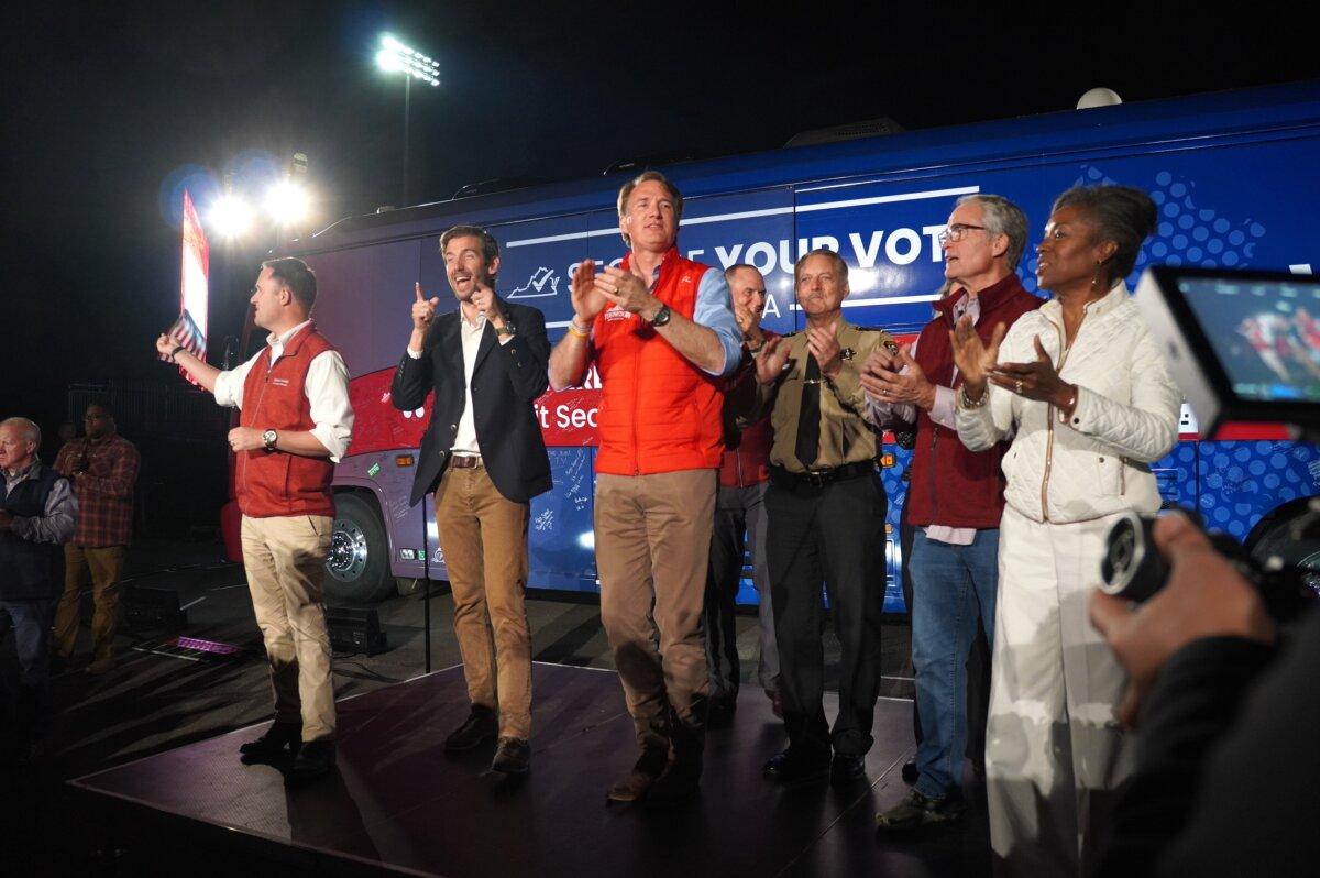 Virginia Gov. Glenn Youngkin (Center in a red vest), Virginia Attorney General Jason Miyares (Left), Juan Pablo Segura, the Republican candidate for Virginia Senate District 31 (2nd left), Loudoun County Sheriff Mike Chapman (3rd right), and Virginia Lt. Governor Winsome Sears (right) at a rally in Leesburg, Va., on Nov. 6, 2023. (Terri Wu/The Epoch Times)