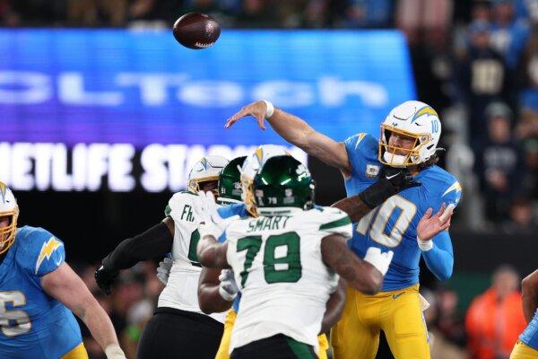 Justin Herbert (10) of the Los Angeles Chargers throws a pass during the first half against the New York Jets at MetLife Stadium in East Rutherford, N.J., on Nov. 6, 2023. (Elsa/Getty Images)