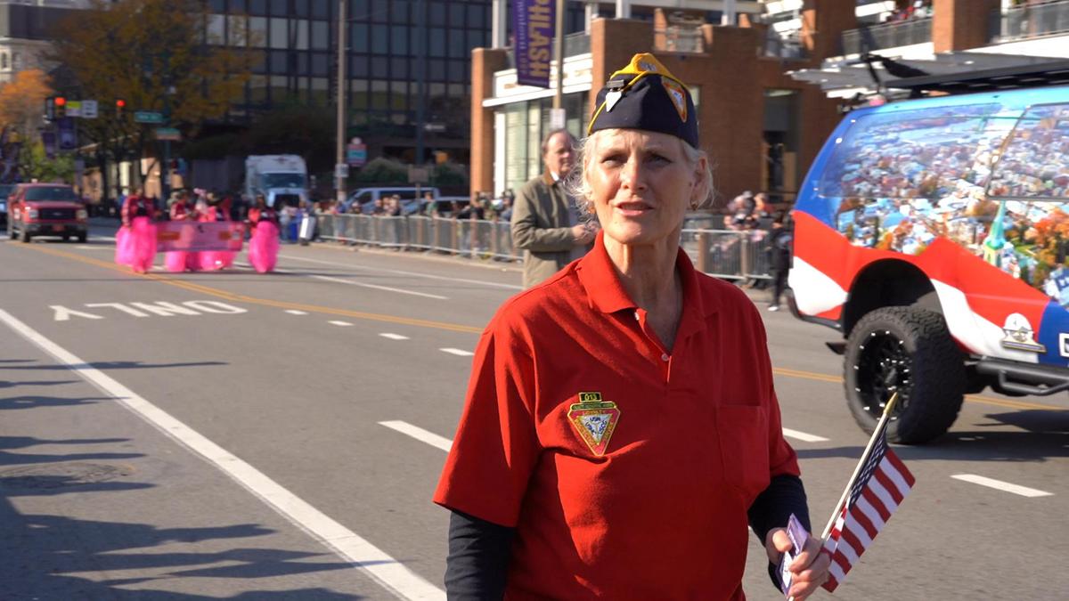 Kim Yoder-Notar, president of the Fleet Reserve Association Branch 13–Atlantic City, walks in the Philadelphia Veterans Parade on Nov. 5, 2023. (William Huang/The Epoch Times)