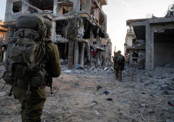 Israeli soldiers take part in ground operations in Gaza, on Nov. 7, 2023. (Israeli Defense Forces/Handout via Reuters)