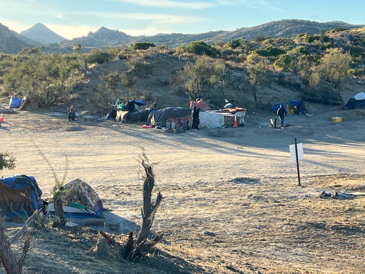 A makeshift migrant encampment sits next to the U.S.-Mexico border in Jacumba, Calif., on Oct. 31, 2023. (Brad Jones/The Epoch Times)
