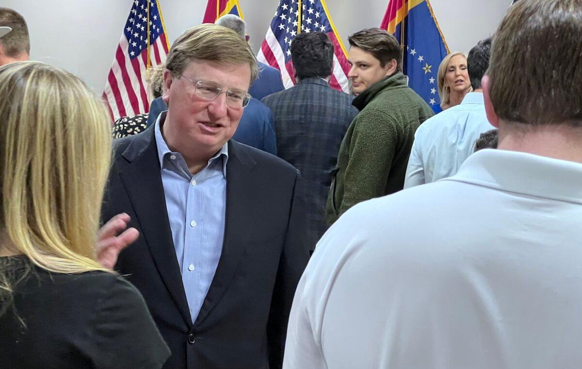 Mississippi Gov. Tate Reeves greets supporters at the state's Republican Party Headquarters in Jackson, Miss., on Nov. 6, 2023. (Lawrence Wilson / The Epoch Times)