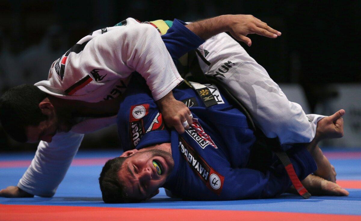 Competitor Rodolfo Veiera of Brazil pins Marcos Almeida of Brazil during the men's black belt open weight finals at the Abu Dhabi World Professional Jiu-Jitsu Championship in the United Arab Emirates on April 19, 2014. (Francois Nel/Getty Images)
