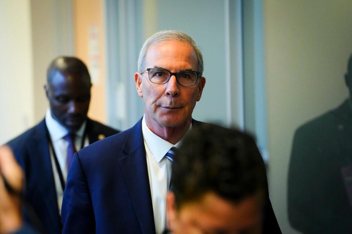 Special counsel David Weiss walks out of the closed-door testimony before the House Judiciary Committee in Washington on Nov. 7, 2023. (Madalina Vasiliu/The Epoch Times)