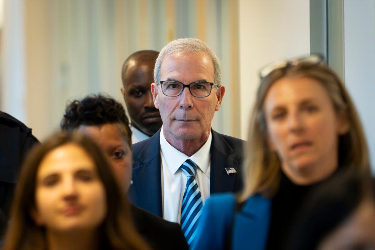 Special counsel David Weiss walks out of the closed-door testimony before the House Judiciary Committee in Washington on Nov. 7, 2023. (Madalina Vasiliu/The Epoch Times)