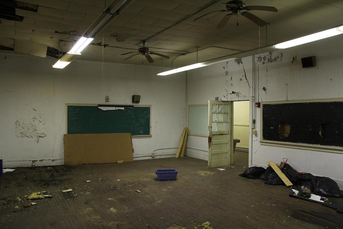 The interiors of the schoolhouse before the transformation began. (Courtesy of Broadway Properties)