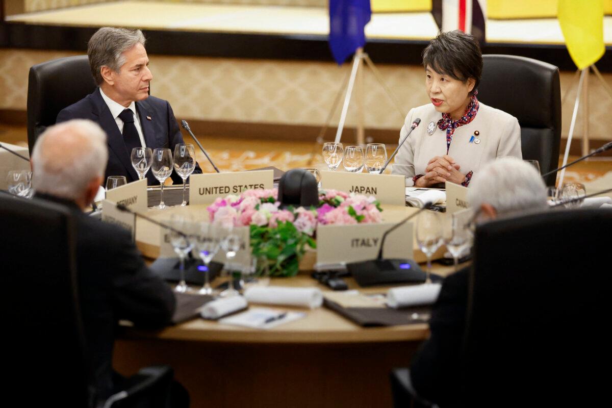 Secretary of State Antony Blinken (top L) and Japanese Foreign Minister Yoko Kamikawa (top R) attend a working dinner as part of their G7 foreign ministers' meetings in Tokyo on Nov. 7, 2023. (Jonathan Ernst/Pool/AFP via Getty Images)