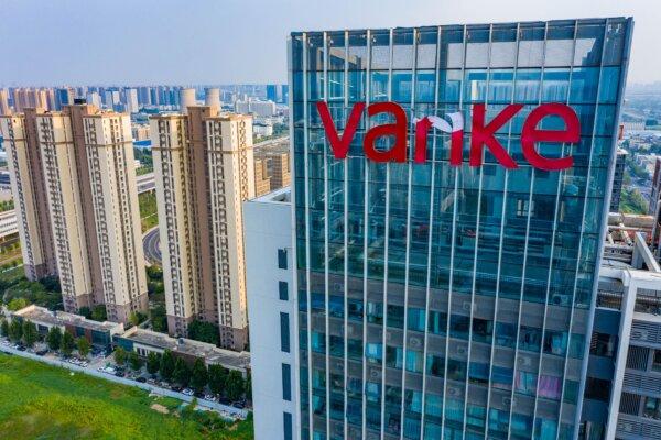 A damaged logo of Chinese real estate developer Vanke at a residential housing complex in Zhengzhou, in China's central Henan Province on Aug. 30, 2023. (AFP via Getty Images)