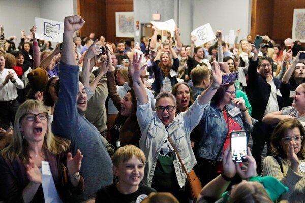 Issue 1 supporters cheer as they watch election results come in in Columbus, Ohio., on Nov. 7, 2023. (Sue Ogrocki/AP Photo)