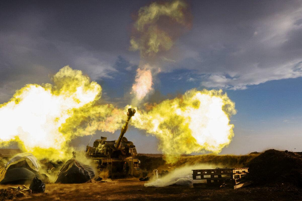 TOPSHOT - An Israeli artillery unit fires during a military drill in the annexed Golan Heights near the border with Lebanon on November 2, 2023. Lebanon's southern border has seen tit-for-tat exchanges, mainly between Israel and Hamas ally Hezbollah, since Hamas militants launched an unprecedented October 7 attack on Israel from the Gaza Strip. (Photo by Jalaa MAREY / AFP) (Photo by JALAA MAREY/AFP via Getty Images)