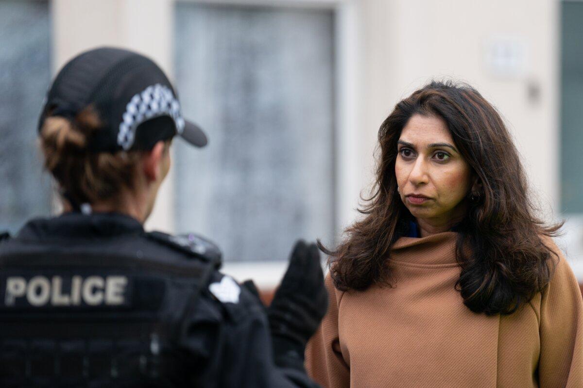 Home Secretary Suella Braverman attending a county lines raid with officers from West Midlands Police in Coventry on Oct. 11, 2023. (Joe Giddens/PA)
