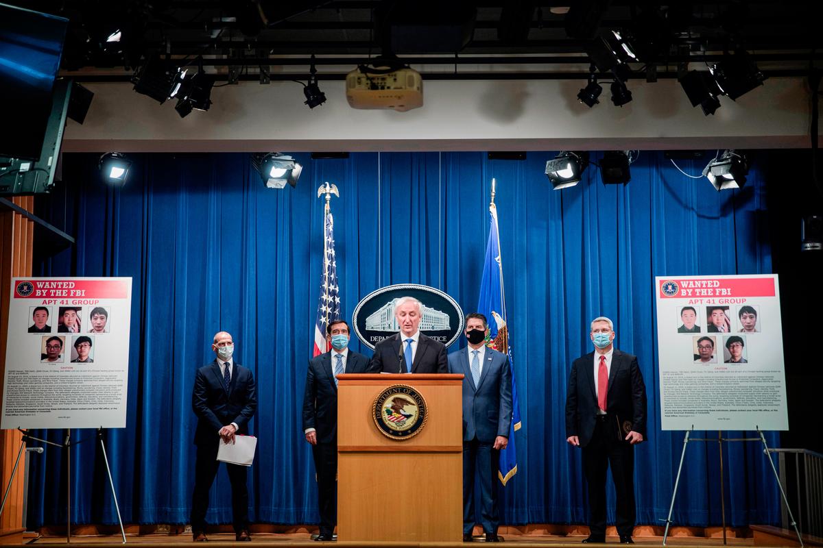 Deputy Attorney General Jeffery Rosen talks about charges and arrests related to a computer intrusion campaign tied to the Chinese regime, at the Department of Justice in Washington on Sept. 16, 2020. (TASOS KATOPODIS/POOL/AFP via Getty Images)