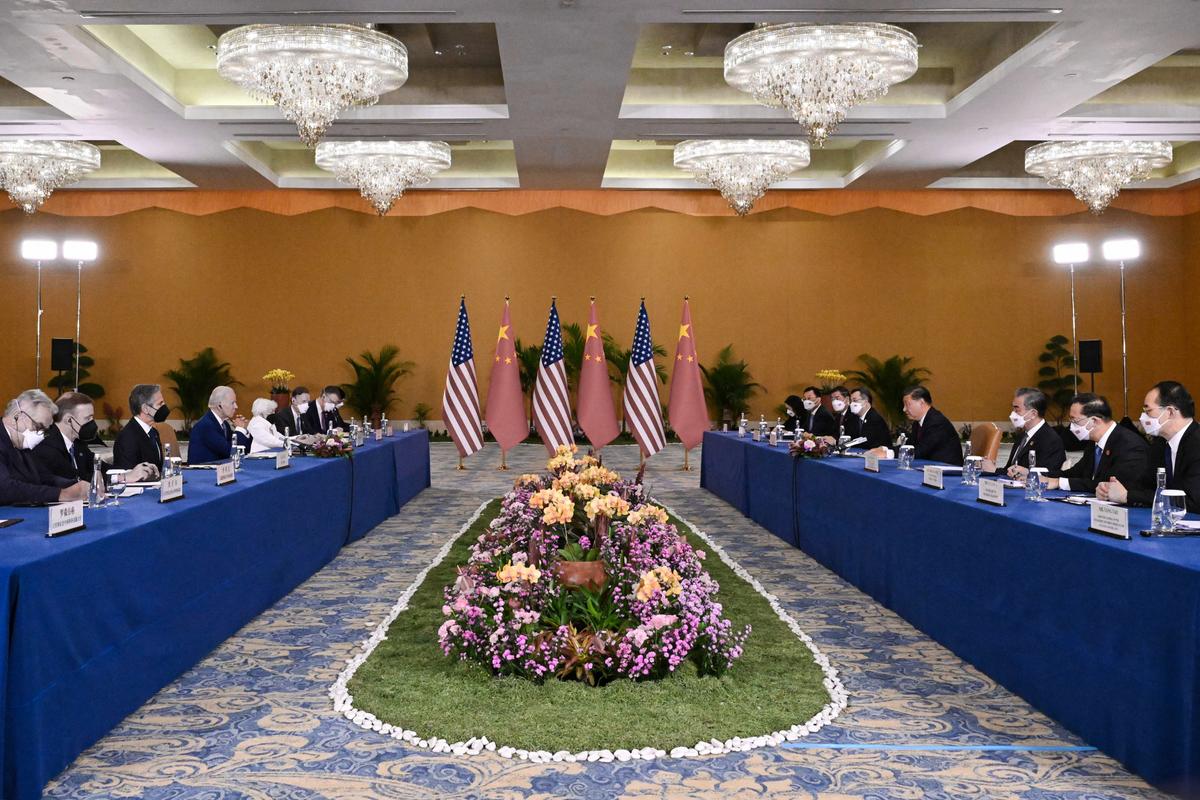U.S. President Joe Biden and Chinese leader Xi Jinping meet on the sidelines of the G20 Summit in Nusa Dua on the Indonesian resort island of Bali on Nov. 14, 2022. (SAUL LOEB/AFP via Getty Images)
