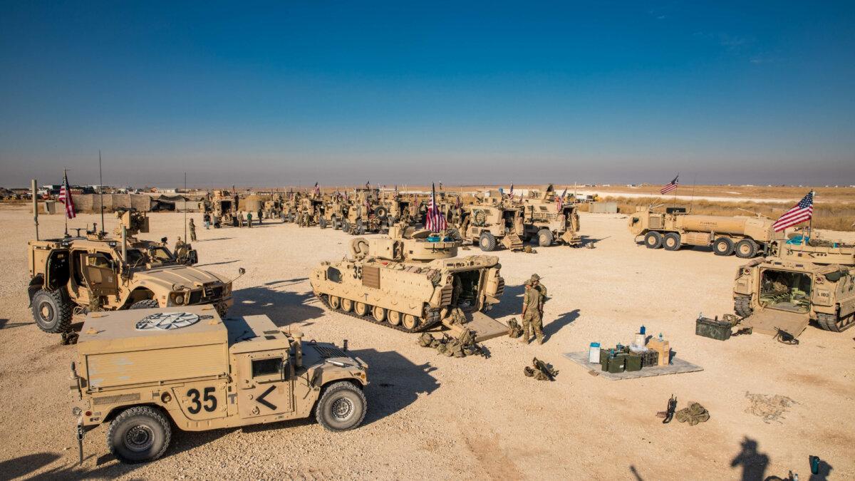 US-Backed Forces in Syria Enter Fray as Fighting Continues in Country’s Northwest | USNN World News U.S. soldiers provide M2A2 Bradley Fighting Vehicles for Combined Joint Task Force-Operation Inherent Resolve in eastern Syria on Nov. 10, 2019. (Spc. DeAndre Pierce/U.S. Army Reserve)