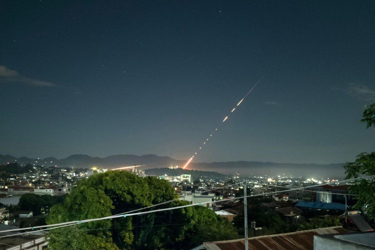 This long exposure picture taken late shows a missile fired from a Burma military base in Lashio township, northern Shan State on Oct. 28, 2023. (STR/AFP via Getty Images)