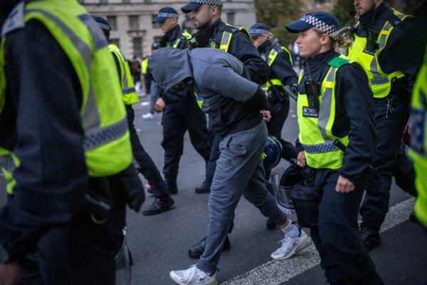 A man is arrested as people protest in support of Palestine in London on Oct. 14, 2023. (Carl Court/Getty Images)