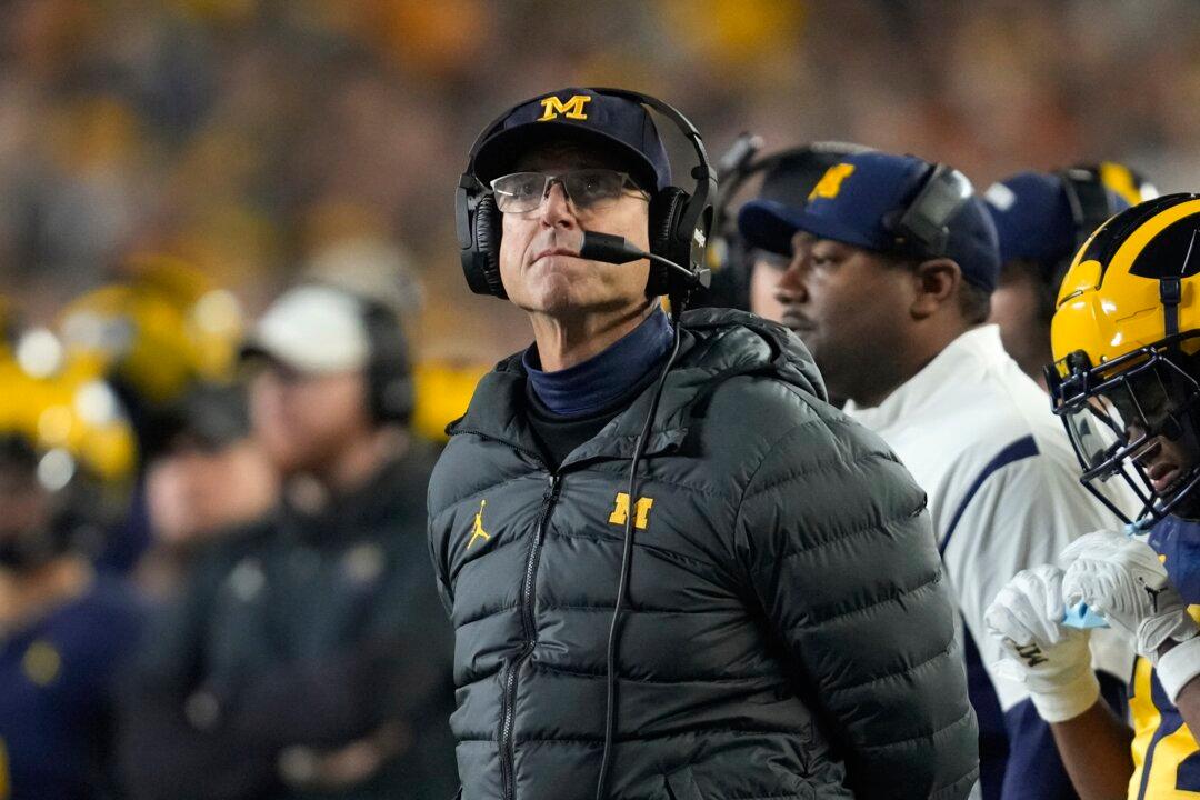 Harbaugh’s Future at Michigan Is Subplot to CFP Title Game as Washington Tries to Lock up DeBoer