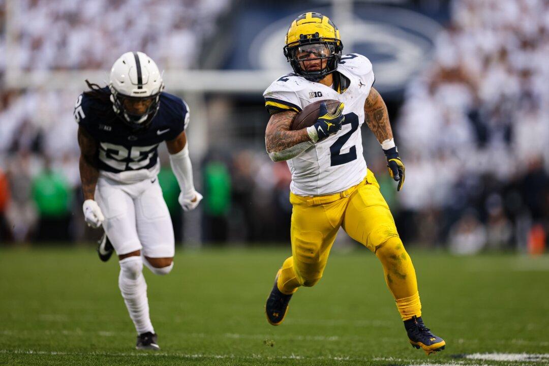 Without Jim Harbaugh, No. 2 Michigan Grinds Past No. 9 Penn State With 32 Straight Runs in 24–15 Win