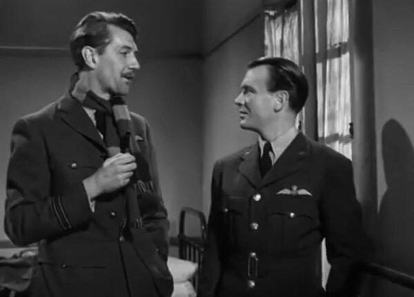 Lt. David Archdale (Michael Redgrave, L) meets young pilot Peter Penrose (John Mills), in “Johnny in the Clouds.” (Metro-Goldwyn-Mayer)