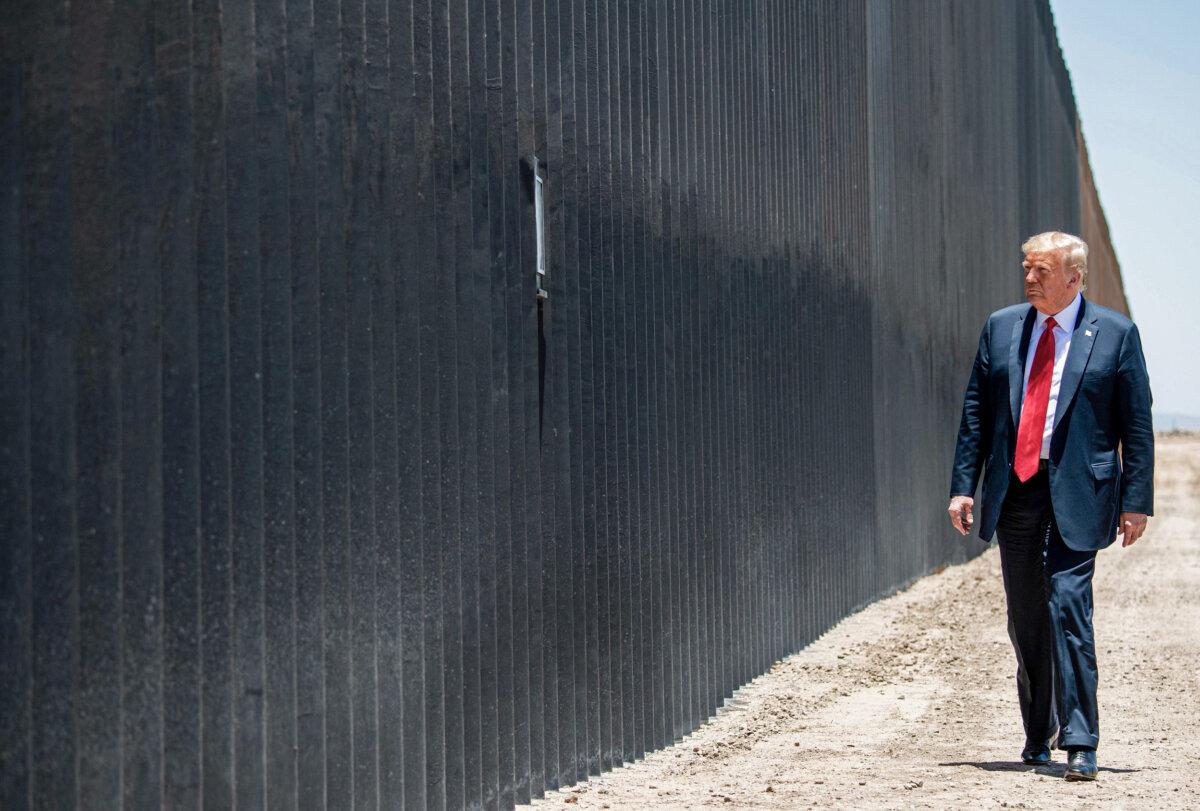 President Donald Trump participates in a ceremony commemorating the 200th mile of border wall at the international border with Mexico in San Luis, Ariz., June 23, 2020. (Saul Loeb/AFP via Getty Images)