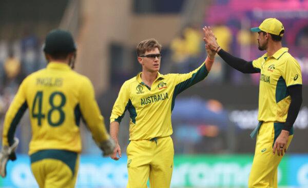 Adam Zampa of Australia celebrates the wicket of Azmatullah Omarzai of Afghanistan during the ICC Men's Cricket World Cup India 2023 between Australia and Afghanistan at Wankhede Stadium in Mumbai, India, on Nov. 7, 2023. (Robert Cianflone/Getty Images)