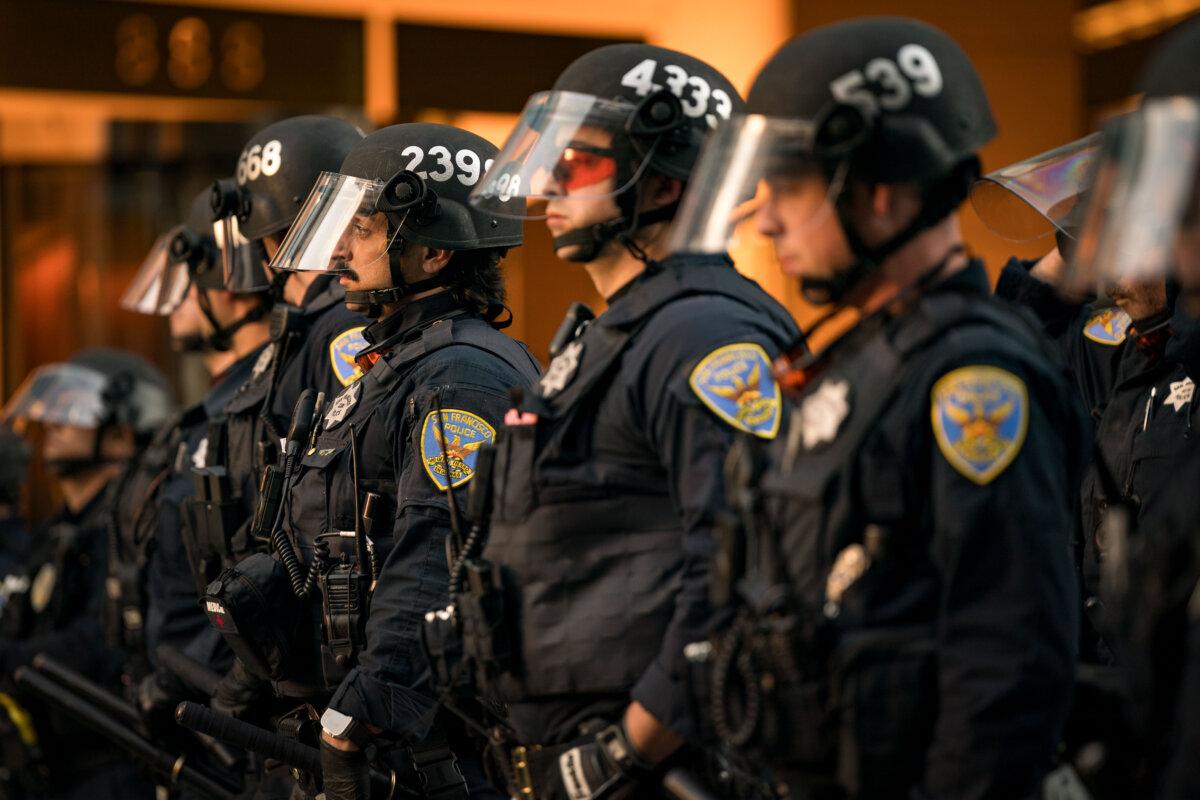 Police arrive to help escort vehicles blocked by protestors in San Francisco on Nov., 12, 2023. (Kent Nishimura/Getty Images)