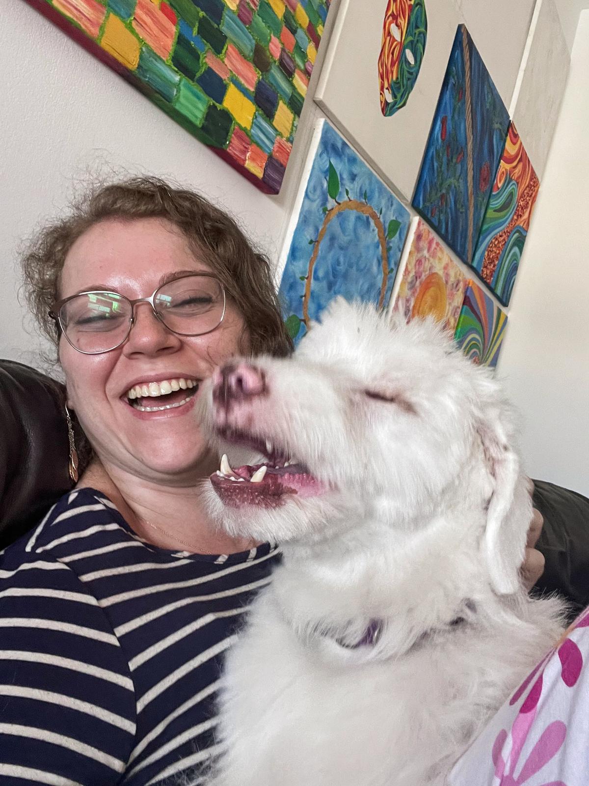 Meira Herman with Coco, a blind dog that she took in after the dog’s owner was called up by the IDF reserves following the Oct. 7 attack on Israel by Hamas. (Courtesy of Meira Herman)