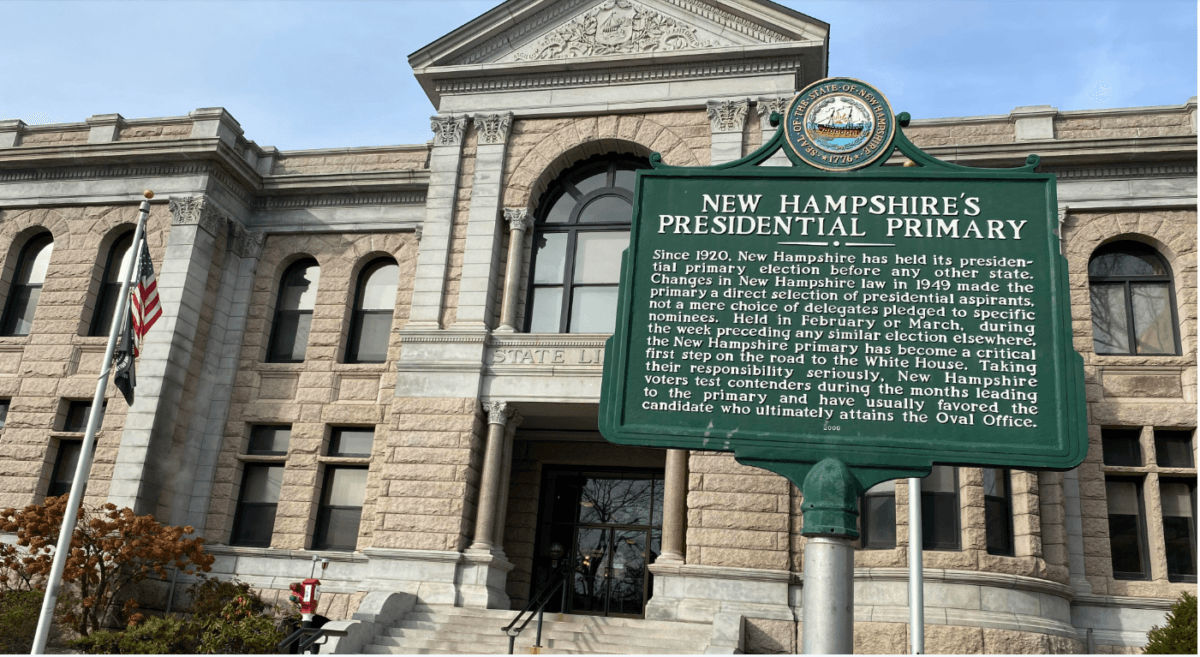 A large plaque commemorating New Hampshire's historic rank in hosting the first presidential primary in the country stands outside of the New Hampshire State Library in Concord, N.H., on Nov. 15, 2023. (Alice Giordano/The Epoch Times)