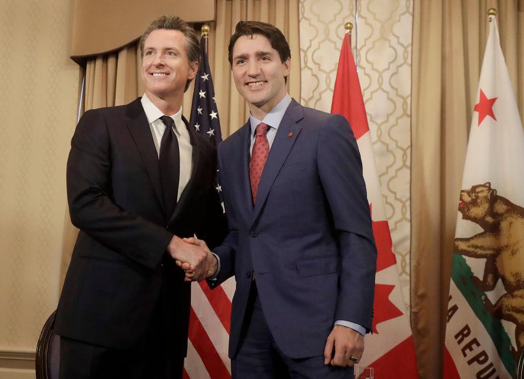 Canada's Prime Minister Justin Trudeau, right, shakes hands with California Lieutenant Governor Gavin Newsom while meeting on Feb. 9, 2018 in San Francisco, California. (Jeff Chiu-Pool/Getty Images)
