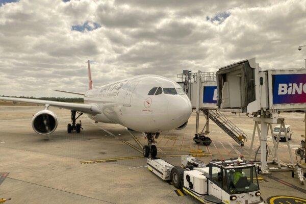 Ground staff preparing a Qantas plane at the Melbourne airport in Melbourne, Australia, on Jan. 31, 2023. (Saeed Khan/AFP via Getty Images)