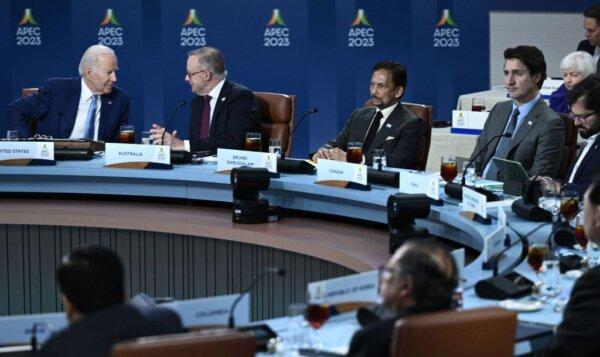 Anthony Albanese, Prime Minister of Australia (2L) and US President Joe Biden (L) speak during a roundtable meeting with World leaders attending the Asia-Pacific Economic Cooperation (APEC) Leaders' Week in San Francisco, Calif., on Nov. 16, 2023. (Brendan Smialowski/AFP via Getty Images)