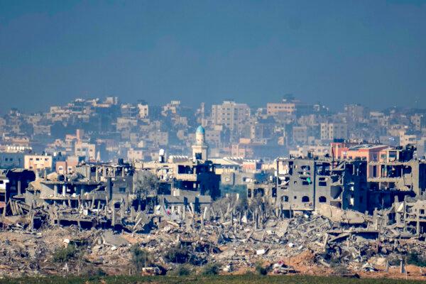In this photograph taken near the Israeli border with the Gaza Strip, destroyed buildings of Beit Hanoun in Northern Gaza are seen, from Sedorot, Israel, on Nov. 16, 2023. (Christopher Furlong/Getty Images)