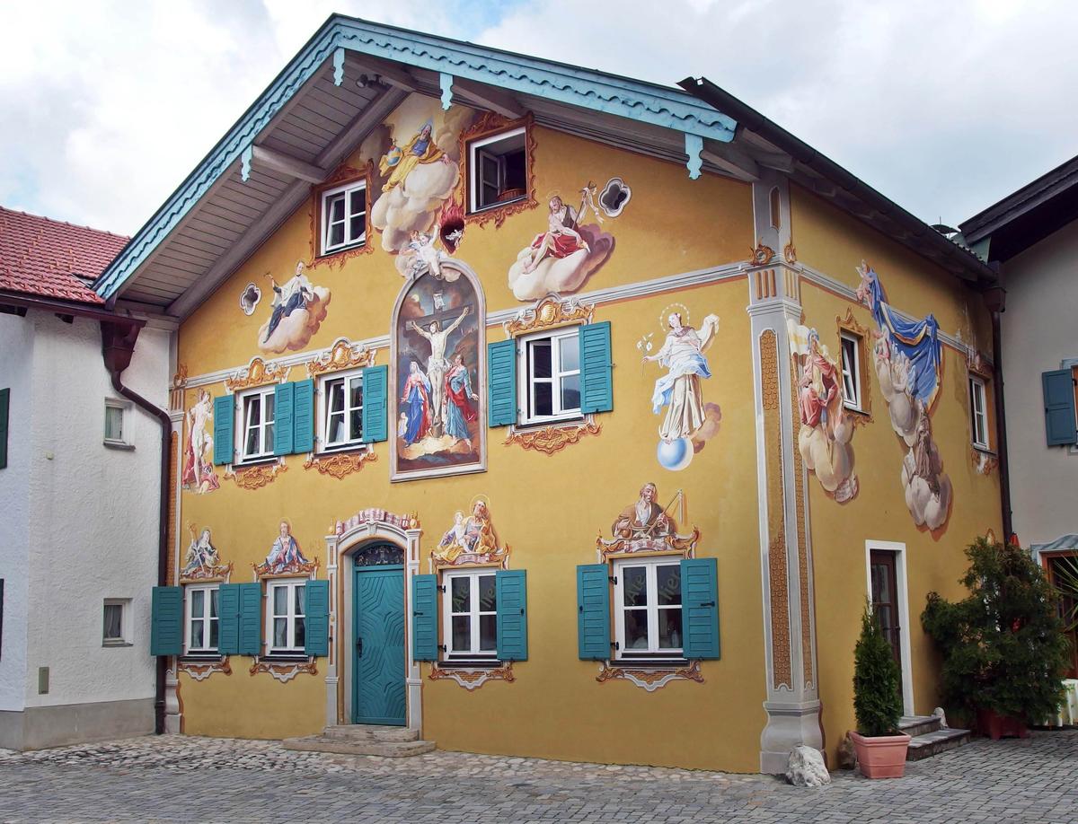 Transcendental scenes are painted on historic buildings throughout Mittenwald, Germany. (kacege/Shutterstock)