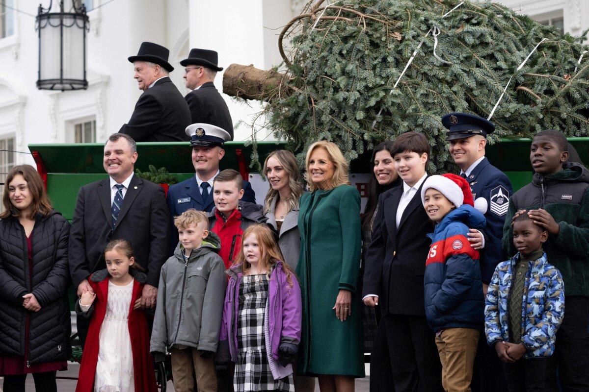  First Lady Jill Biden receives the official 2023 White House Christmas Tree on the North Lawn of the White House on Nov. 20, 2023. (Saul Loeb/AFP via Getty Images)