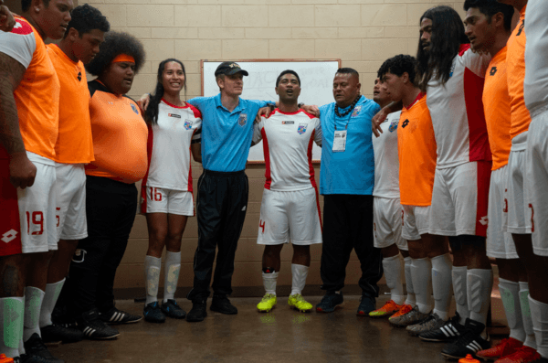 “Next Goal Wins” cast members, including Michael Fassbender (left, in blue), Lehi Falepapalangi (third from left), Kaimana (fourth from left), and Beulah Koale (sixth from left). (Hilary Bronwyn Gayle/Searchlight Pictures)