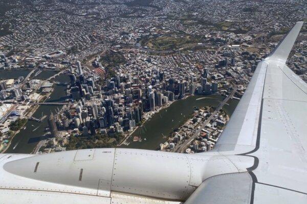 A photo taken on Aug. 27, 2022 from a Qantas 737 passenger aircraft shows Brisbane's central business district and its surrounding suburbs. (William West/AFP via Getty Images)