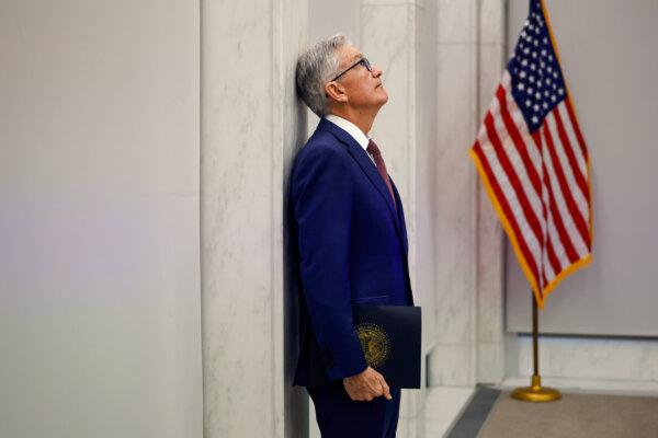 Federal Reserve Chairman Jerome Powell prepares to deliver remarks to the Federal Reserve's Division of Research and Statistics Centennial Conference in Washington on Nov. 8, 2023. (Chip Somodevilla/Getty Images)